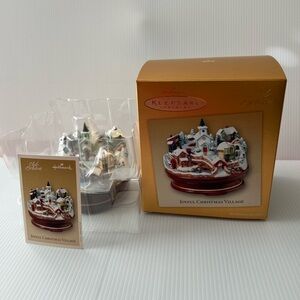 2004 Hallmark Christmas Ornament, Joyful Christmas Village musical, and motion